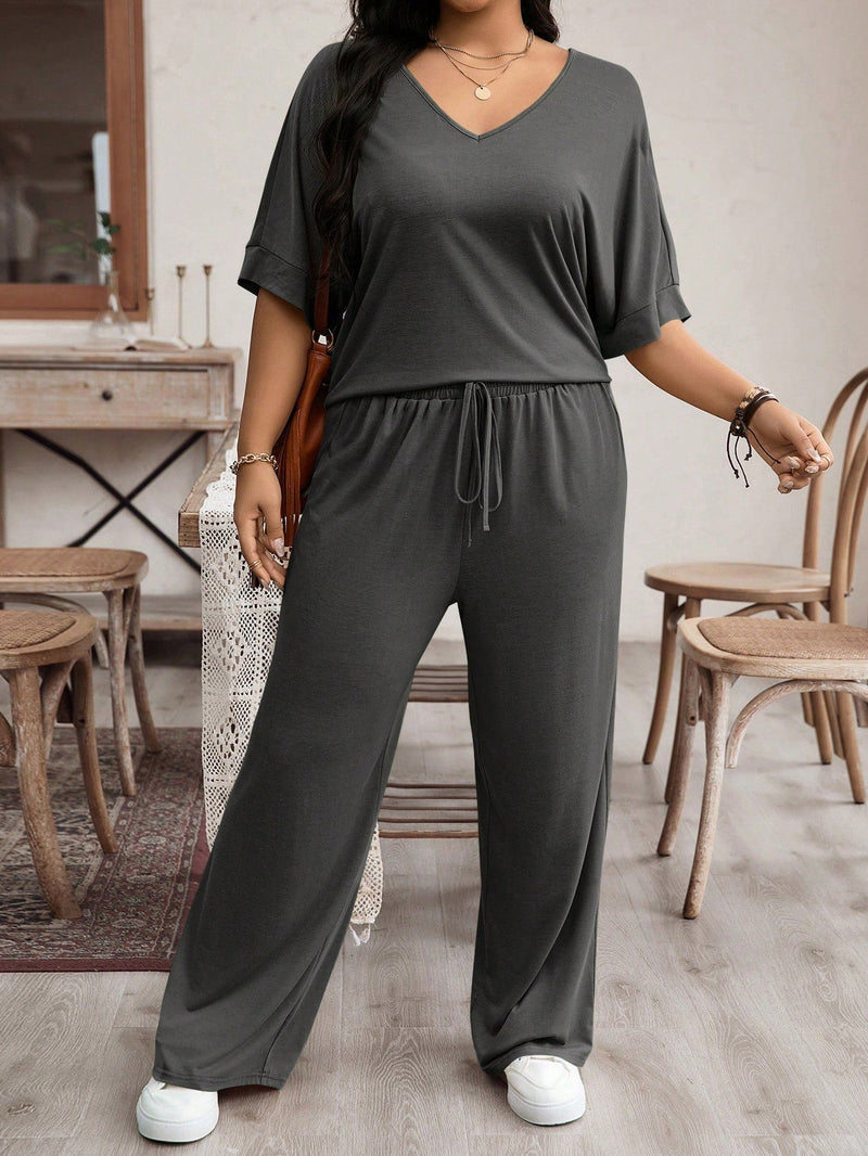 Conjunto Feminino camiseta com manga morcego e calça larga - Karol. Plus Size