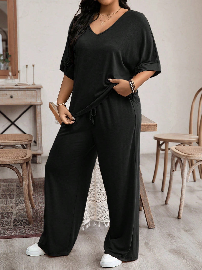 Conjunto Feminino camiseta com manga morcego e calça larga - Karol. Plus Size