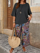 Conjunto Feminino camisa em gola redonda e calças de perna larga - Ligía. Plus Size