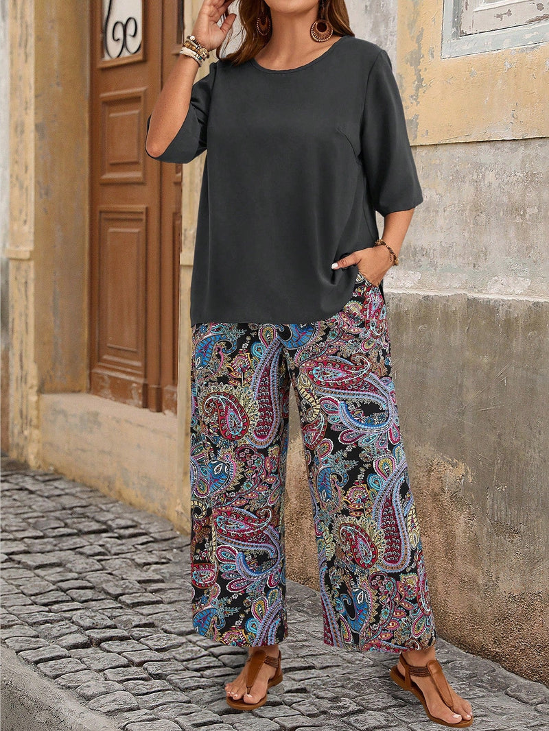 Conjunto Feminino camisa em gola redonda e calças de perna larga - Ligía. Plus Size