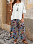 Conjunto Feminino camisa em gola redonda e calças de perna larga - Ligía. Plus Size