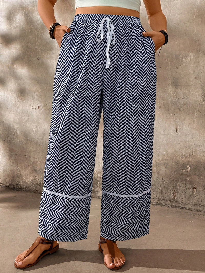 Calça casual feminina larga, estampa espinha de peixe Geane. Plus Size