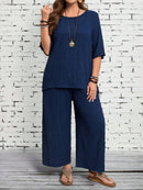 Conjunto Feminino camisa em gola redonda e calças de perna larga - Ligía. Plus Size