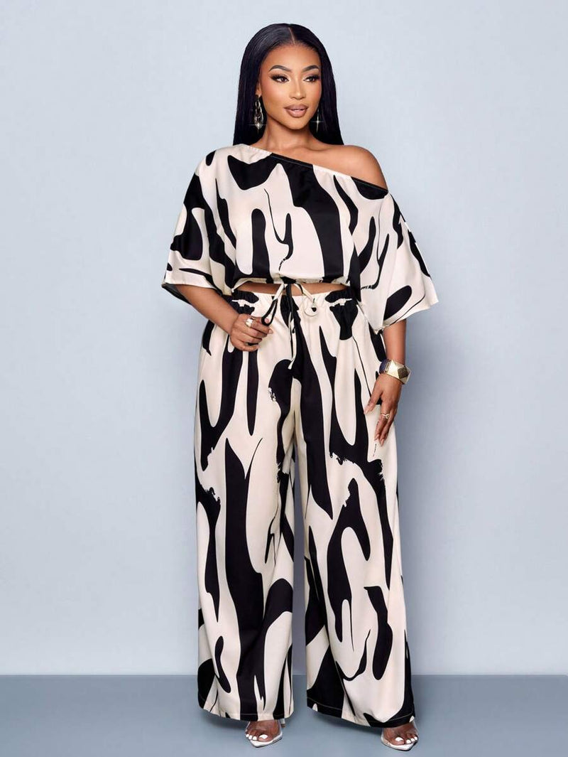 Conjunto Feminino com Decote Assimétrico e Estampa Completa - Monique. Plus Size